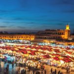 Evening Djemaa El Fna Square with Koutoubia Mosque, Marrakech, Morocco